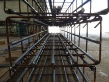 20140213_130313 Prefabricated reinforcing cage made of cut and bent rebar for concrete column.